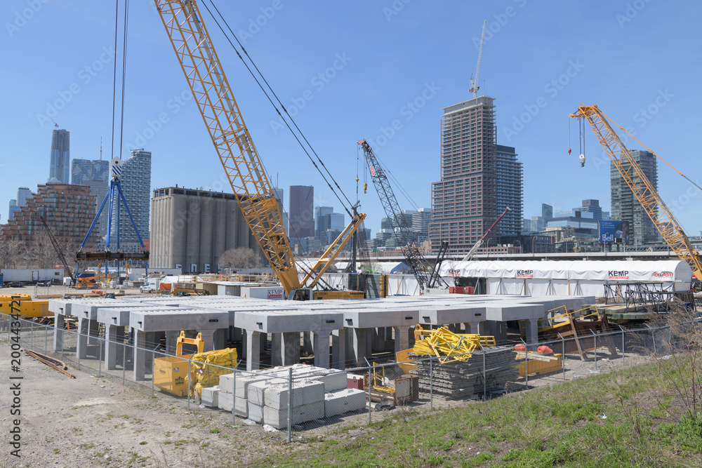 Fototapeta premium construction site at Cherry Street Yard with view of No. 31 Condominiums, Toronto