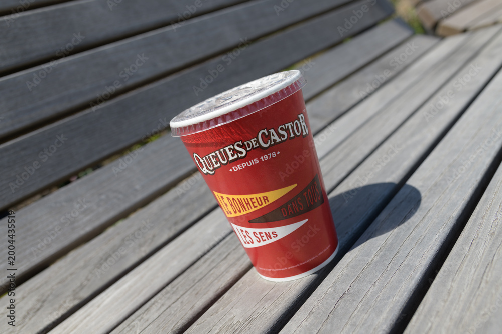 Fototapeta premium discarded BeaverTails (Queues de Castor) cup in Toronto