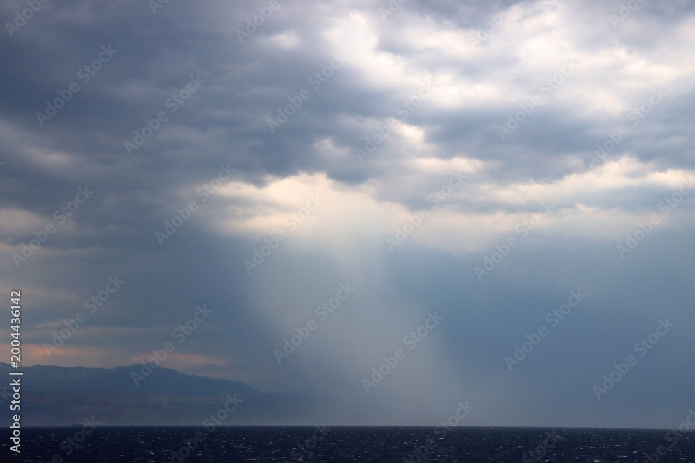 Obraz premium Clouds and storm over the sea.