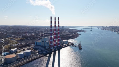 Aerial View Power Plant Producing Electricity Halifax Nova Scotia Canada Natural Gas And Fuel Oil Facility Pipes High Voltage Wires Industrial Energy Production Near Ocean 4K