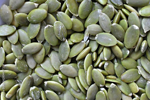 dense pile of green pumpkin seeds