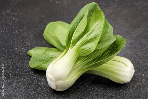 Fotografie Pak choi or bok choy or fresh Chinese cabbage with crisp green leaves and tender