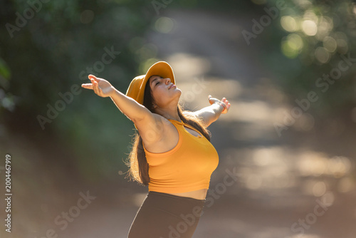 Woman feeling freedom and peace in nature