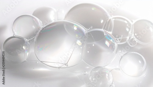 Macro photography of bioplastic bubbles, iridescent shimmer, floating in a clean white void.
