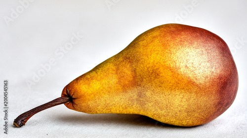 Ripe red pear on a light surface with isolated botanical ingredient nutrition delicious refreshing