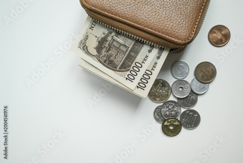 Personal Savings with Japanese Currency and Leather Wallet