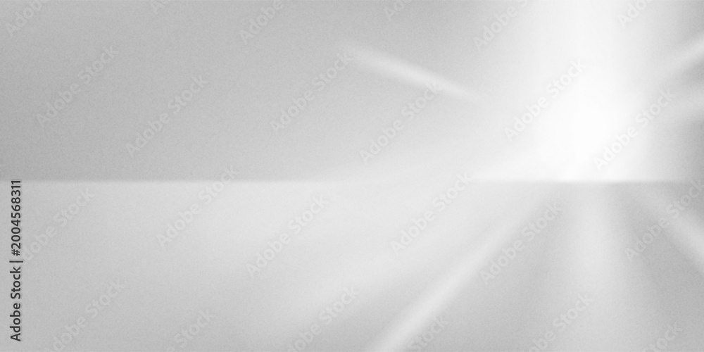 Obraz premium Bright light creating soft reflections on a white surface.