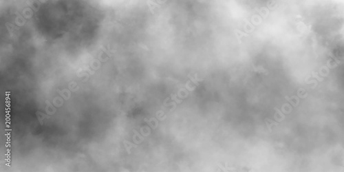 Fotografie Abstract white puffs of smoke swirls overlay on black fog background pollution, perfect for adding depth and digital and creative designs, empty space studio dark room with white spot lighting