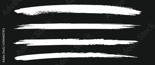 Slika na platnu Four white brush strokes on a for design and decoration purposes