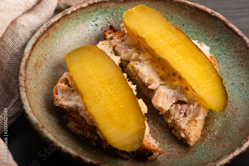 Quadro su tela Bread with Lard and Pickled Cucumber on Handmade Ceramic Plate