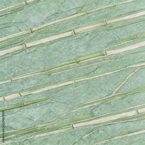 Bamboo stalks on textured surface