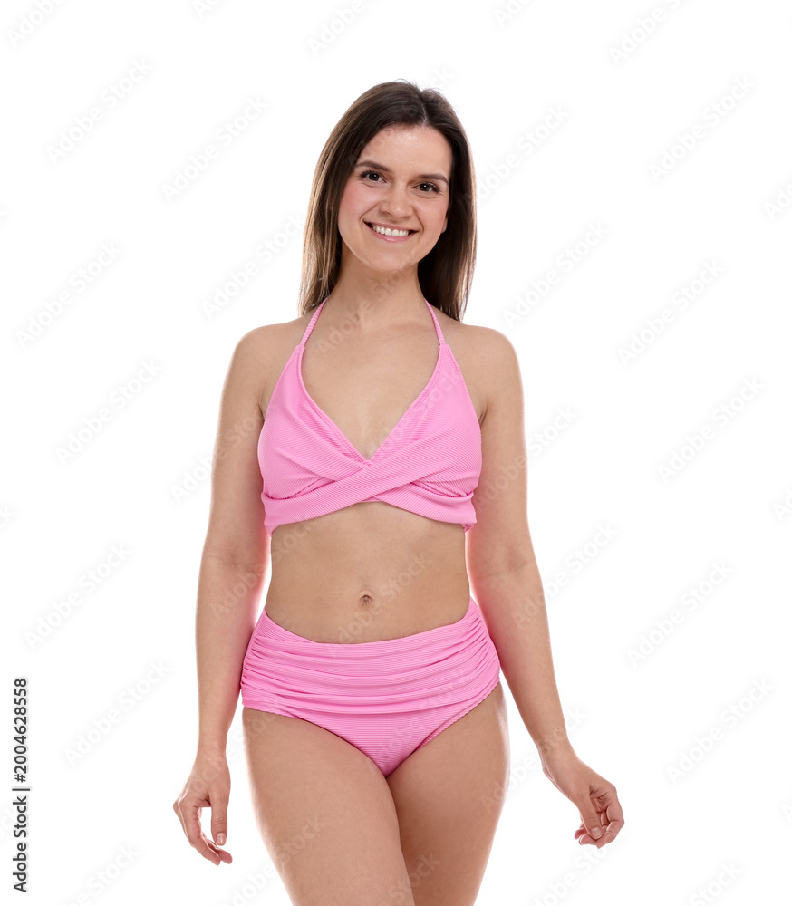 Fototapeta premium Woman in pink swimsuit on white background