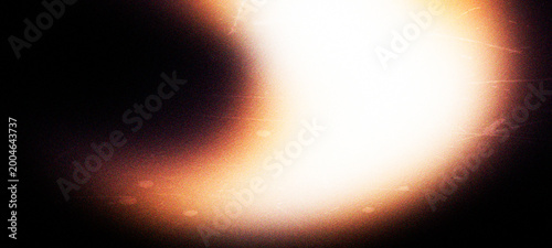 Φωτογραφία Bright orange light leak background with heavy grain texture and cinematic flare