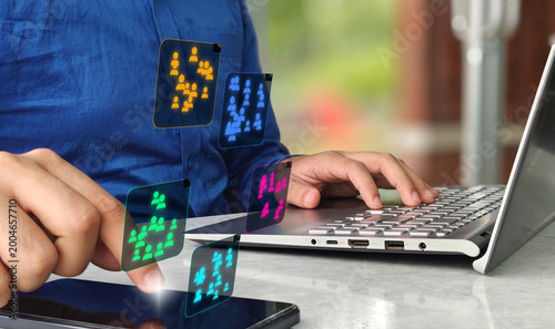 Business person working laptop smartphone data transfer network connection technology digital marketing