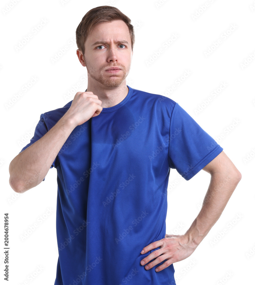 Obraz premium Man suffering from sweating on white background