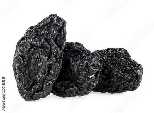 Sweet prunes isolated on a white background. Fruit of dried prunes. Dried plums.