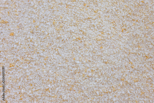 Macro texture of couscous grains horizontal semolina wheat food background