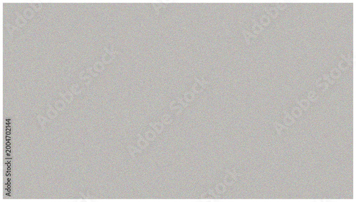 Tableau sur toile A gray background with a grainy texture and multicolored speckles throughout
