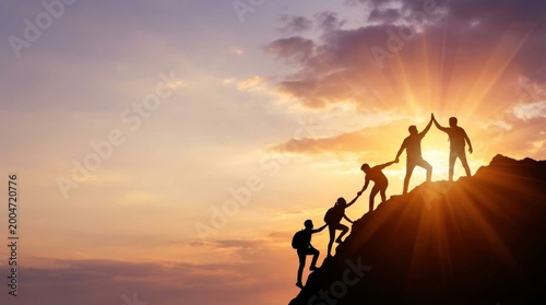 Silhouette of climbers who climbed to the top of the mountain thanks to mutual assistance and teamwork. Silhouette of business team helping each teamwork and success concept with copy space