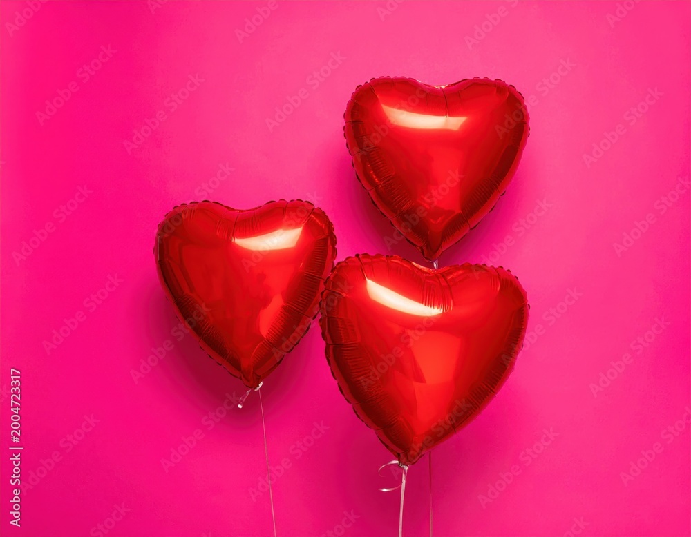 Fototapeta premium Red heart balloons on pink wall, romantic celebration decor, festive party backdrop, Valentine promotion