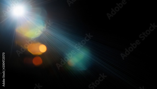 easy to add lens flare effects for overlay designs or screen blending mode to make high quality images abstract sun burst digital flare iridescent glare over black background defocused bokeh
