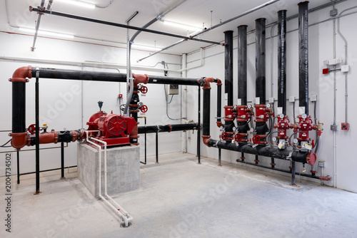 Foto Indoor mechanical room with water pump for fire protection system