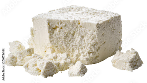 Cuadro en lienzo Crumbled fresh ricotta cheese block with textured surface, isolated on transpare