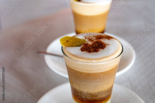 Glasses of barraquito Canarian speciality coffee made with more layers, alcohol and sweet milk
