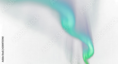 Mystical aurora curtains in cool cyan teal color cascading downwards designed for high end cinematic production against a pitch black dark canvas to emphasize contrast.