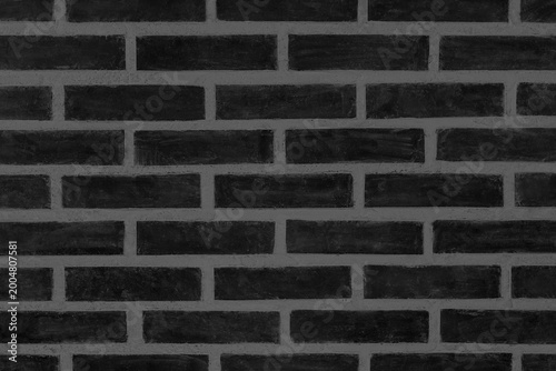 Old black dark brick wall structure cement pattern backdrop texture concrete background