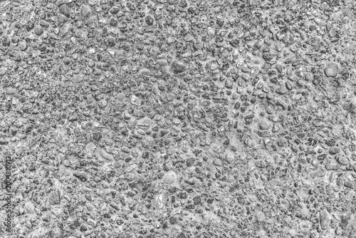 Small stones grain concrete detail slab cement surface structure wall texture backdrop gray background pattern abstract