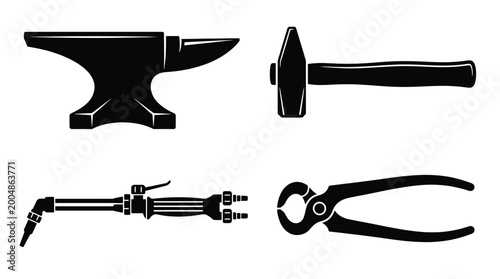 Fotografija Blacksmithing tools anvil, hammer, welding torch, and tongs