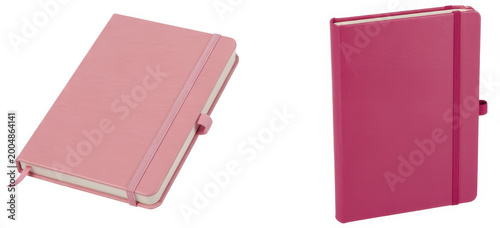 Two pink notebooks with elastic bands and bookmarks isolated on a plain white background