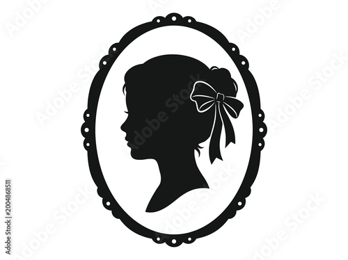Photos Vintage silhouette of a young womans profile with a bow in her hair, framed in a