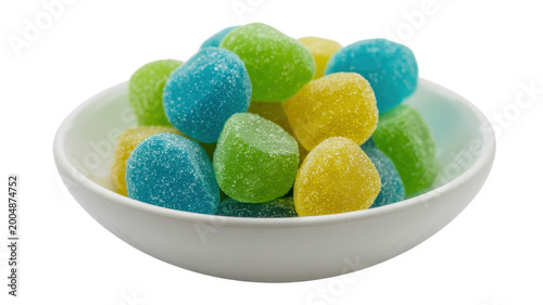 Small white bowl filled with colorful sugared gummy candies on a plain white background