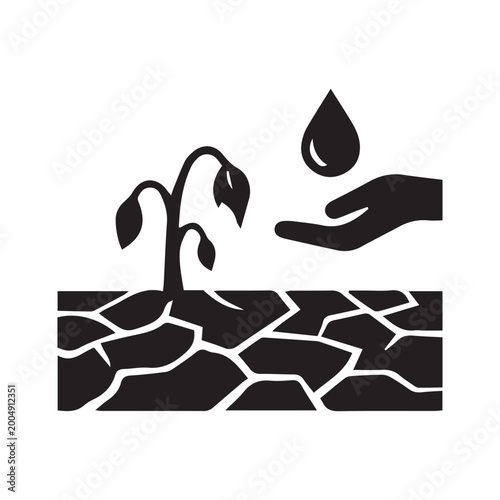 Drought and water conservation concept with withered plant on cracked earth and hand holding water drop