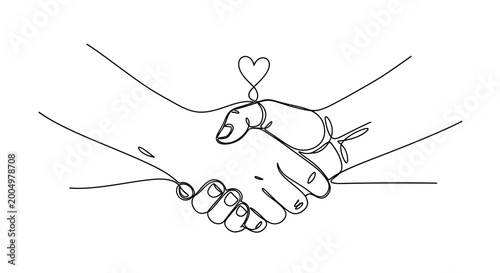 Φωτογραφία Handshake with heart symbol joining hands.