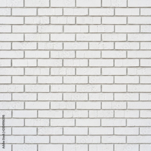 white brick wall, exterior masonry texture, light grey grout, modern brick pattern, urban architecture detail, clean white bricks, horizontal brick layout, industrial wall finish, simple brick texture