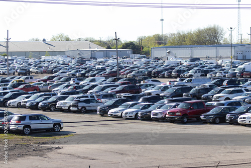 Rockford, Illinois, USA - April 26, 2026: Hundreds of cars in a parking lot at an auto auction and junkyard facility.