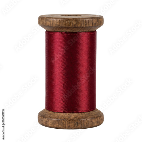 Fotografía Wooden spool with red silk thread isolated
