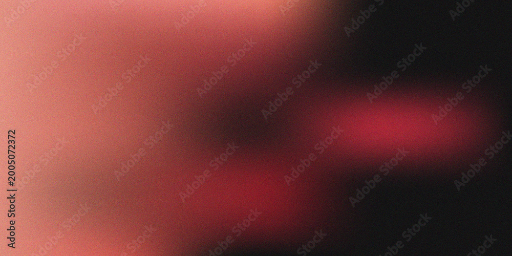 Obraz premium Abstract Cinematic Film Grain Texture with Red Light Leaks and Soft Blurred Glow on Black Background
