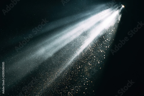 Beams of Light Piercing Dark Space Illuminating Suspended Dust Particles Sparkling Ethereal Effect Scattering Diffusion Photography