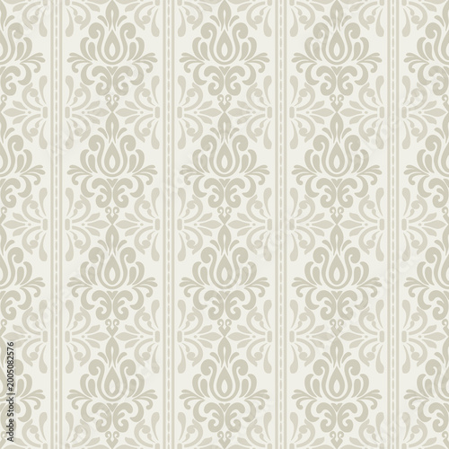 Elegant damask seamless pattern with vertical ornaments in a classic beige damask seamless pattern for luxury hotel wallpaper, elegant textile design, and classic home decor.