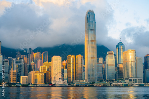Hong Kong cityscape skyline at morning sunrise sky across Victoria harbor. One of the most tourist attaction in Hong Kong Island, China.