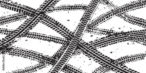 Overlapping tire track grunge background: intersecting wheel tread marks with dirt speckles, bold black and white rugged automotive texture design