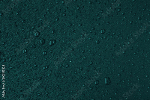 Fotografie Macro leather texture with water drops, waterproof and hydrophobic surface conce