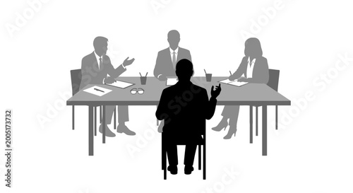 Silhouette of man at job interview with business panel