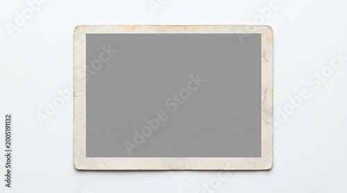 Vintage blank photo print mockup with aged white border, gray placeholder center, retro paper texture, and clean background for nostalgic design
