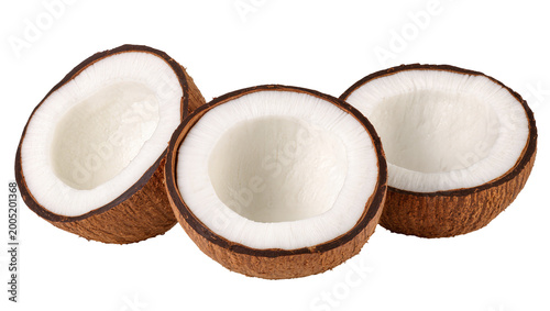 Foto Three halved Coconuts showing white flesh and brown husk