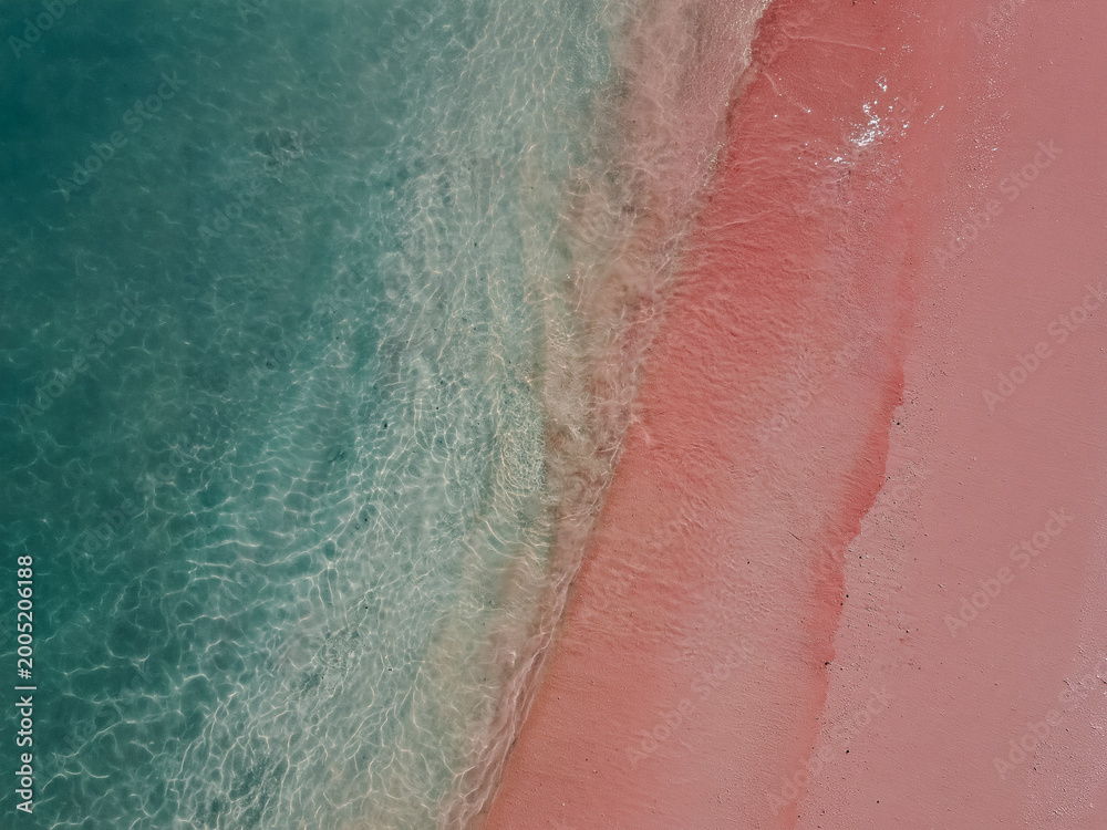 Fototapeta premium Pink Beach Crystal Clear Turquoise Water and Unique Pink Sand in Komodo National Park